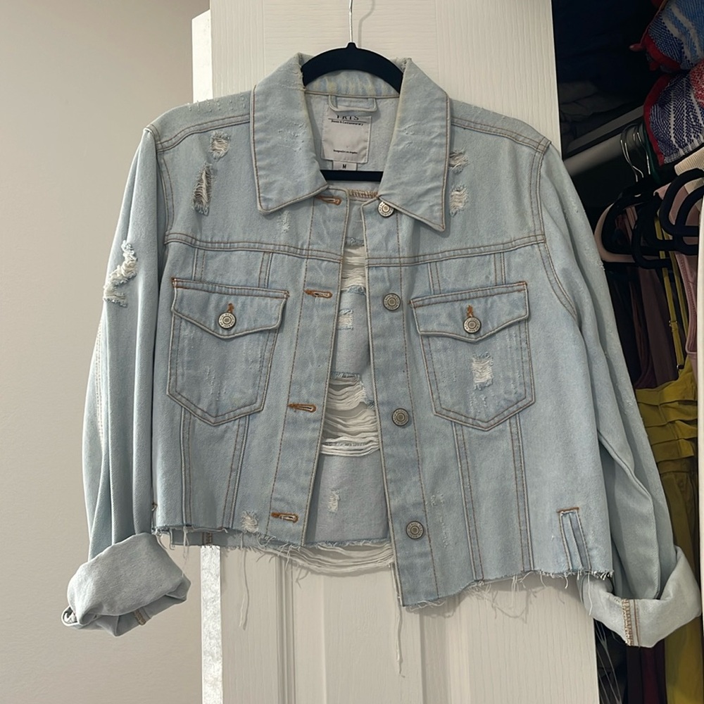 Distressed denim jacket